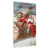 Gnomes dragging a cut tree trunk through the snow klembord (Rechts)