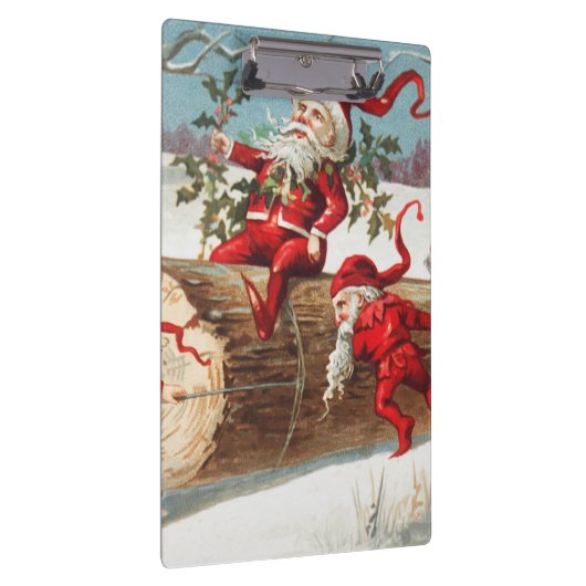 Gnomes dragging a cut tree trunk through the snow klembord (Rechts)