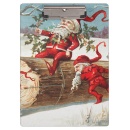 Gnomes dragging a cut tree trunk through the snow klembord