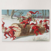 Gnomes dragging a cut tree trunk through the snow legpuzzel (Horizontaal)