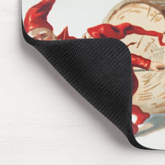 Gnomes dragging a cut tree trunk through the snow muismat (Hoek)