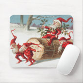 Gnomes dragging a cut tree trunk through the snow muismat (Met muis)