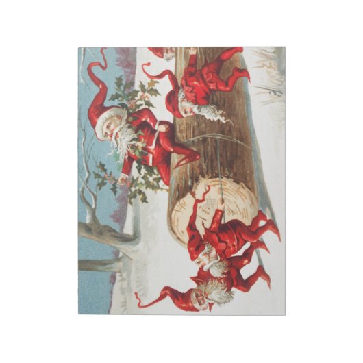 Gnomes dragging a cut tree trunk through the snow notitieblok (Linkerzijde)