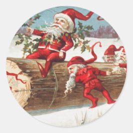 Gnomes dragging a cut tree trunk through the snow ronde sticker