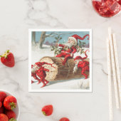 Gnomes dragging a cut tree trunk through the snow servet (Insitu)