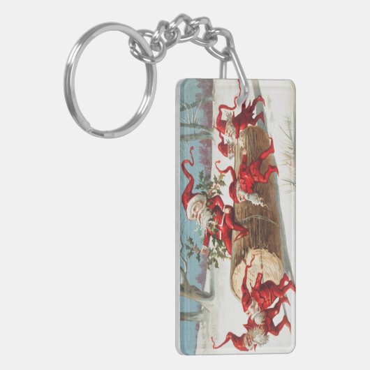 Gnomes dragging a cut tree trunk through the snow sleutelhanger (Voorkant Links)