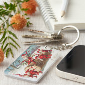 Gnomes dragging a cut tree trunk through the snow sleutelhanger (Voorkant Rechts)