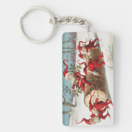 Gnomes dragging a cut tree trunk through the snow sleutelhanger