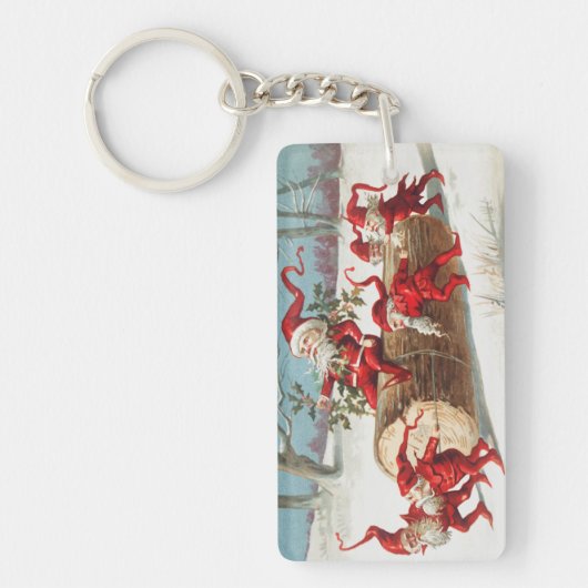 Gnomes dragging a cut tree trunk through the snow sleutelhanger (Voorkant)