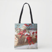 Gnomes dragging a cut tree trunk through the snow tote bag (Voorkant)