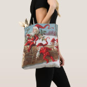 Gnomes dragging a cut tree trunk through the snow tote bag (Dichtbij)