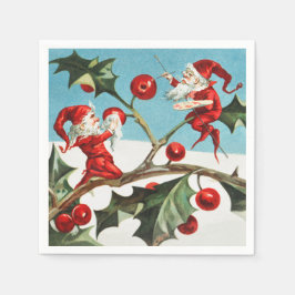 Gnomes painting holly berries in the snow servet