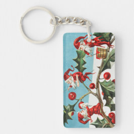 Gnomes painting holly berries in the snow sleutelhanger