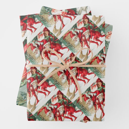 Gnomes sweeping snow with a broom inpakpapier vel (In situ)