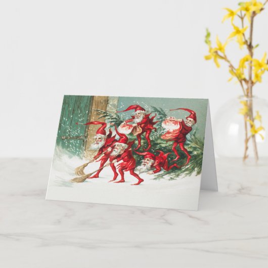 Gnomes sweeping snow with a broom kaart (Gele Bloem)