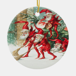 Gnomes sweeping snow with a broom keramisch ornament