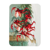 Gnomes sweeping snow with a broom magneet (Verticaal)