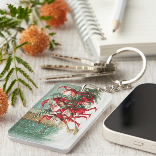 Gnomes sweeping snow with a broom sleutelhanger (Voorkant Rechts)