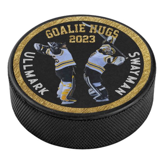 Goalie Hugs Hockey Puck