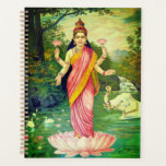 Goddess Lakshmi Planner<br><div class="desc">Lakshmi is in de Indiase kunst afgebeeld als een elegant geklede, welvarende gouden kleurige vrouw die in padmasana op een lotustroon staat of zit, terwijl ze een lotus in haar hand houdt, symbool staat voor fortuin, zelfkennis en spirituele bevrijding. Haar iconografie show haar met vier handen, die de vier aspecten...</div>