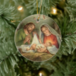 Godsdienstige  kerstfeestdag Jezus Mary  Keramisch Ornament<br><div class="desc">Deze mooie kerstversiering is voorzien van een mooie traditioneel katholieke kerstfoto van de Nativiteit,  de Maagd Mary met Sint Joseph die de Baby Jezus in de woede bewondert.</div>