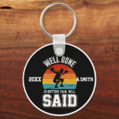 Goed gedaan is beter dan goed gezegd sleutelhanger (Achterkant)