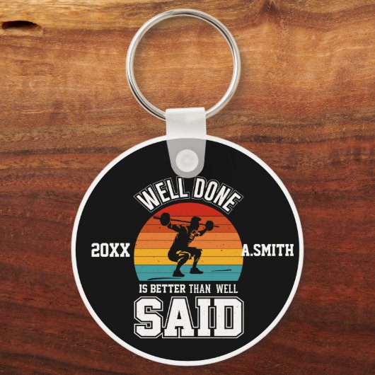Goed gedaan is beter dan goed gezegd sleutelhanger (Achterkant)