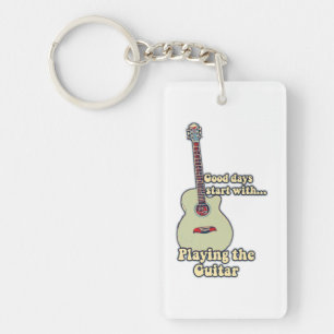 Goede dagen beginnen met het spelen van de gitaar. sleutelhanger