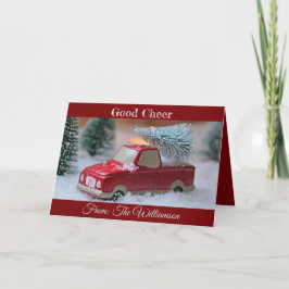 Goede juichen met vrachtwagen en dennenboom op de  feestdagen kaart