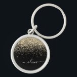 Gold Black Glitter Script Monogram Girly Name Sleutelhanger<br><div class="desc">Gold en Black Glitter Script Monogram Name Keychains (Sleutelhanger). Dit maakt de perfecte liefhebbende 16 verjaardag,  bruiloft,  vrijgezellenfeest,  verjaardagsdag,  baby shower of vrijgezellenfeest voor iemand die van luxe glam en stijl houdt.</div>