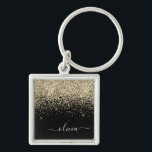 Gold Black Glitter Script Monogram Girly Name Sleutelhanger<br><div class="desc">Gold en Black Glitter Script Monogram Name Keychains (Sleutelhanger). Dit maakt de perfecte liefhebbende 16 verjaardag,  bruiloft,  vrijgezellenfeest,  verjaardagsdag,  baby shower of vrijgezellenfeest voor iemand die van luxe glam en stijl houdt.</div>