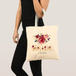 Gold Burgundy Blush Floral Bride Wedding Tote Bag<br><div class="desc">Deze geweldige canvas tas kenmerkt het woord Bride in goud met prachtige bruine en bloemen. Personaliseer met uw trouwdatum of de naam van de ontvanger onder. Ideaal voor de Bride. Zoek dit ontwerp op meer producten in onze winkel. Eenvoudig aan te passen met aangepaste opties. Gebruik de knop 'Aanpassen' om...</div>