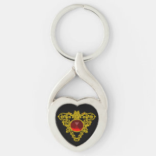 GOLD CELTIC HEART JEWEL MET RODE RUBY GEMSTONE SLEUTELHANGER