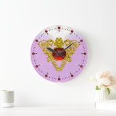 GOLD CELTIC HEART MET RODE RUBY, zwart Grote Klok (Huis)