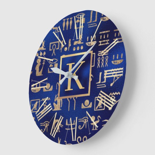 Gold Egyptian Hieroglyphics on Blue Intial Grote Klok (Hoek)