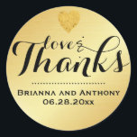 Gold Elegant Script Wedding Bedankt Sticker<br><div class="desc">Gloeiende gouden achtergrond met zwarte letters creëer een klassieke bruiloft dank u sticker. Decoratieve typografie maakt een stijlvol statement van liefde en bedankt. Een kleine gouden folie hart foto verfraait de top van de bruiloft sticker. De bruid en bruidegom namen en hun trouwdatum voltooit de sticker dan kan worden gebruikt...</div>