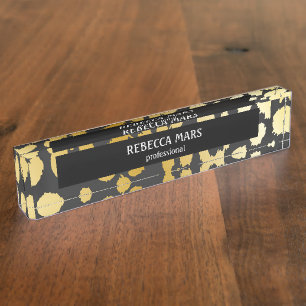 Gold- en zwarte luipaard bord op de schrijftafel naambordje