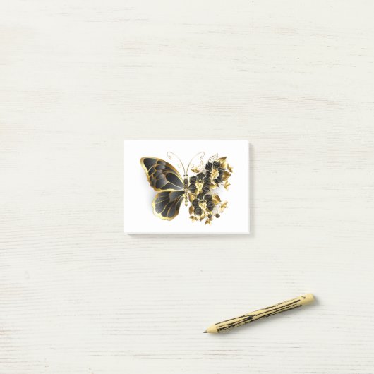 Gold Flower Butterfly met Black Orchid Post-it® Notes (Op bureau)