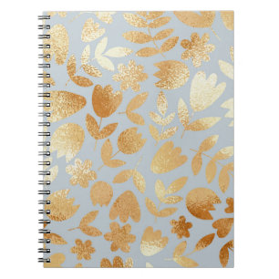 Gold flowers, blue background, foil imitation. notitieboek