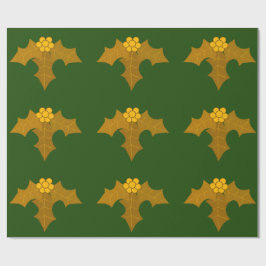 Gold Holly op donkergroen inpakpapier