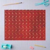 Gold kerstrenrendiertje op de rode lospagina tissuepapier (Craft)