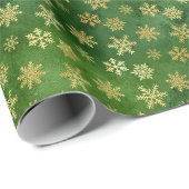 Gold kerstsnowflakes op groen cadeaupapier (Rol Hoek)
