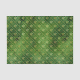 Gold kerstsnowflakes op groen tissuepapier