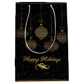 Gold lantern en stofzucht over zwarte achtergrond  medium cadeauzakje (Voorkant)