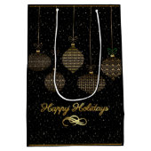 Gold lantern en stofzucht over zwarte achtergrond  medium cadeauzakje (Achterkant)