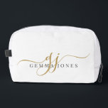 Gold Monogram Script Name Toilettasje<br><div class="desc">Draag uw stijl waar u ook gaat met deze elegante monogram doppkit. Ontworpen met sierlijke gouden script initialen in combinatie met een verfijnde serif naam, het combineert moderne sophisticatie met de dagelijkse functie. Perfect voor het dragen van make-up en andere kleine items dagelijks of voor overnachtingen. Deze veelzijdige kleine accessoiretas...</div>