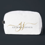Gold Monogram Script Name Toilettasje<br><div class="desc">Draag uw stijl waar u ook gaat met deze elegante monogram doppkit. Ontworpen met sierlijke gouden script initialen in combinatie met een verfijnde serif naam, het combineert moderne sophisticatie met de dagelijkse functie. Perfect voor het dragen van make-up en andere kleine items dagelijks of voor overnachtingen. Deze veelzijdige kleine accessoiretas...</div>