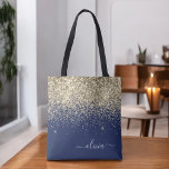 Gold Navy Blue Girly Glitter Sparkle Monogram Naam Tote Bag<br><div class="desc">Navy Blue en Gold Faux Sparkle en Glitter Elegant Monogram Book Bag. Deze Book Bag kan worden aangepast om uw initiaal en voornaam op te nemen en wordt gegeven als cadeau voor Kerstmis,  Sweet 16 Birthday,  Vrijgezellenfeest of een bruiloft.</div>