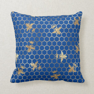 Gold Queen bijen en Honeycomb op blauw Kussen
