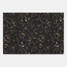 Gold-rozen op een zwarte papierflatset van 3 inpakpapier vel